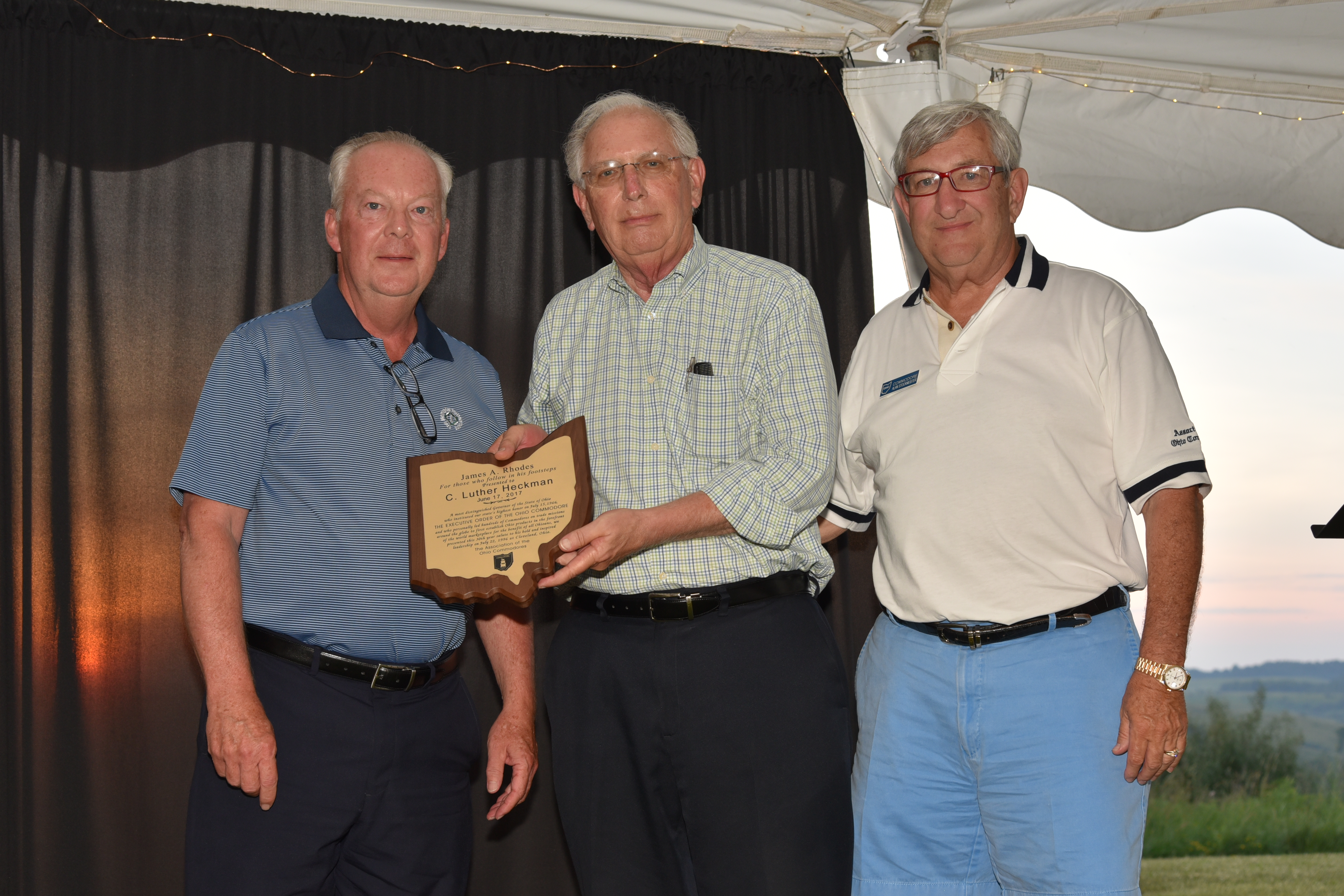 C. Luther Heckman receives James A. Rhodes Award from Steve Landerman and Grand Commodore Alan Stockmeister